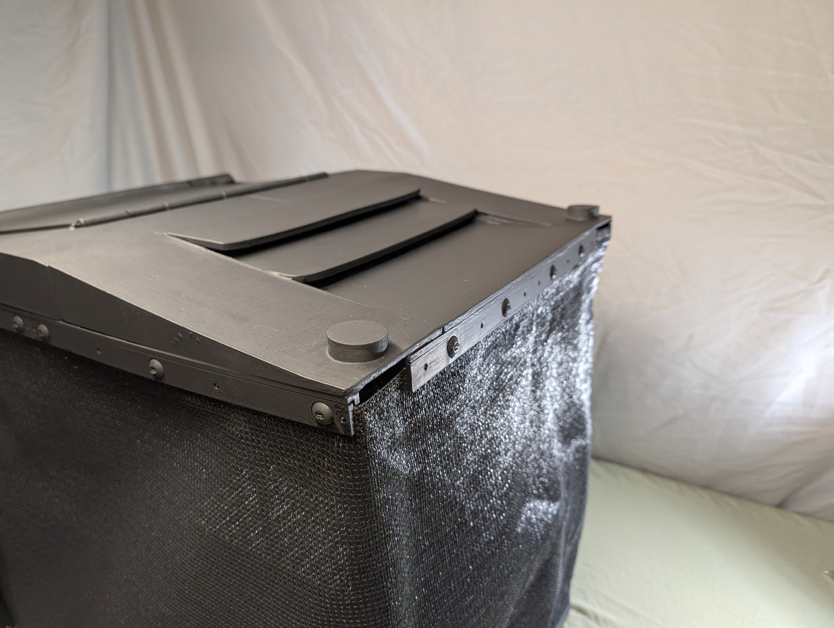 Grubhouse black soldier fly bin with shade-cloth walls and vented roof, kept in the shade